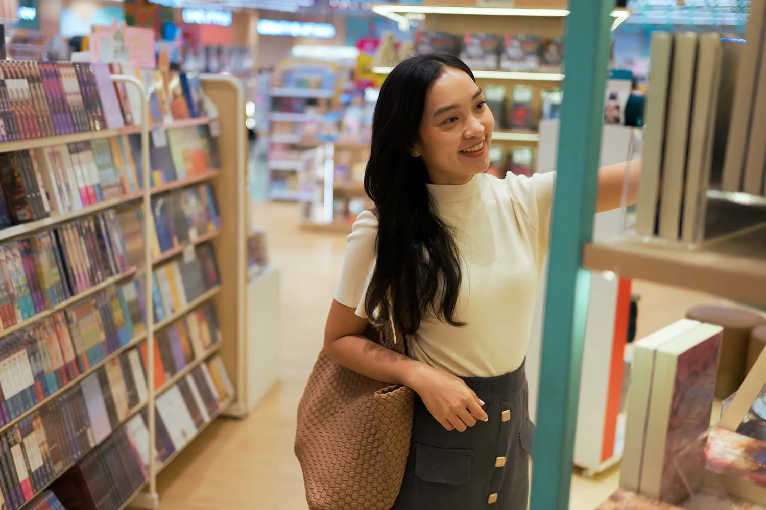 girl browsing at a bookstore